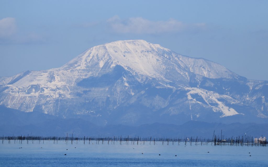 Mount Ibuki seen from Lake Biwa in Shiga Prefecture, Japan.